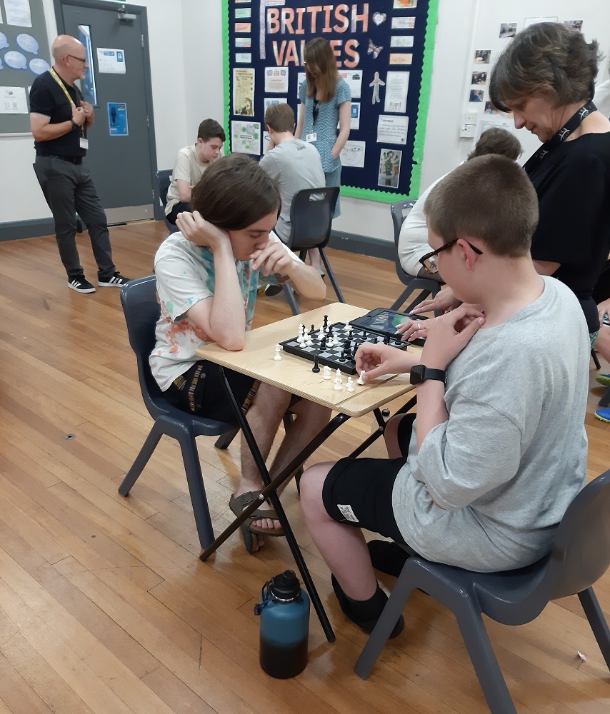 Pupils playing chess
