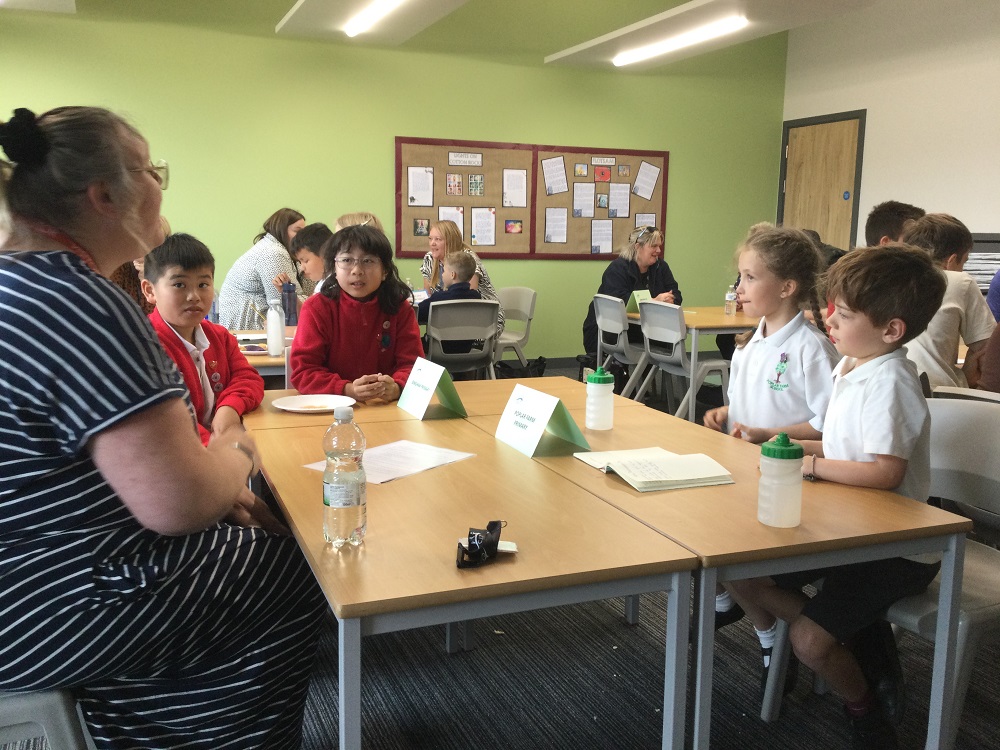 Pupils from Poplar Farm School and Bingham Primary School asking Trustee Jo Slesser questions