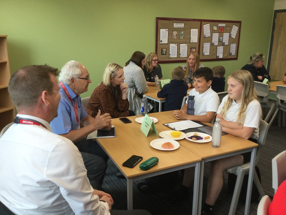 Isaac Newton pupils asking Trustee Paul Boucher questions