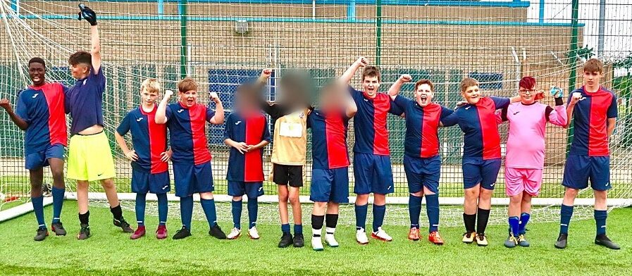Pupils cheering as they win the 2023 CIT football tournament at the Mere's Leisure Centre in Grantham. Working with schools across the East Midlands.