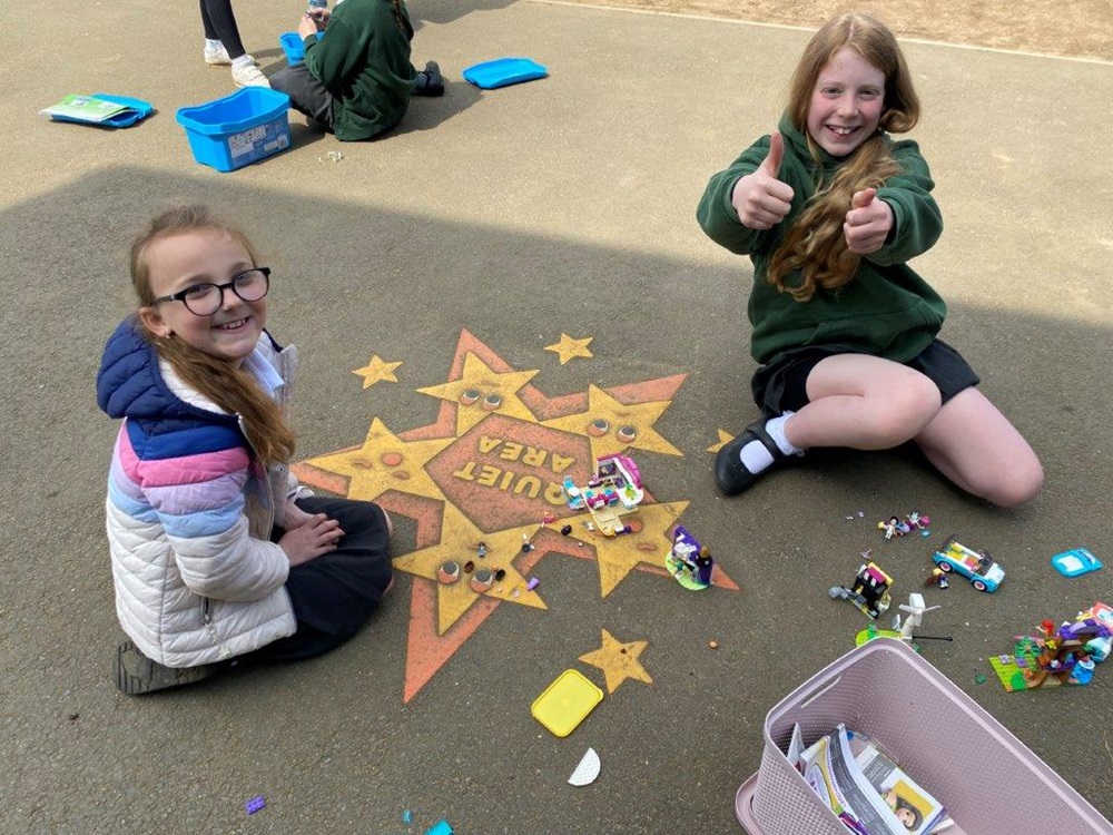 Pupils play with donated lego