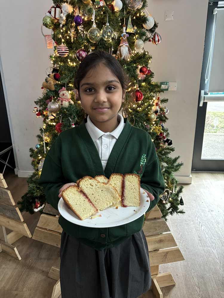 Pupil handing out cake