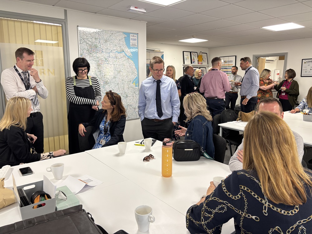 Headteachers chat together