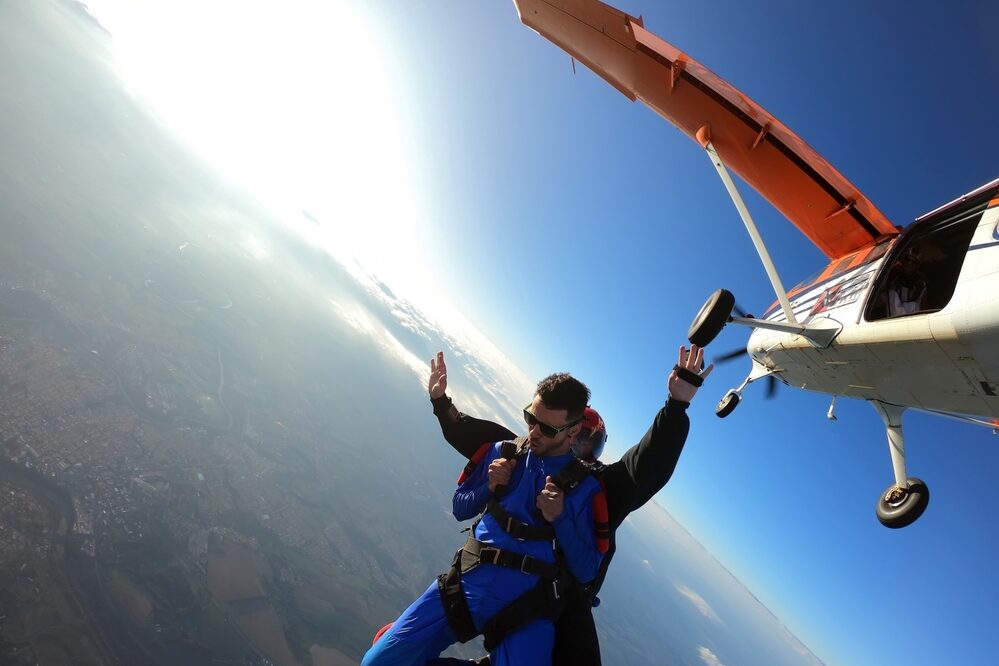 tandem sky diving out of a plane
